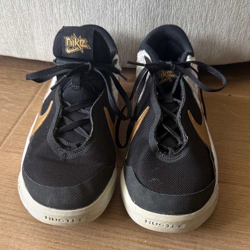 Nike Men’s Black and Gold Low-Top Sneakers with White Soles